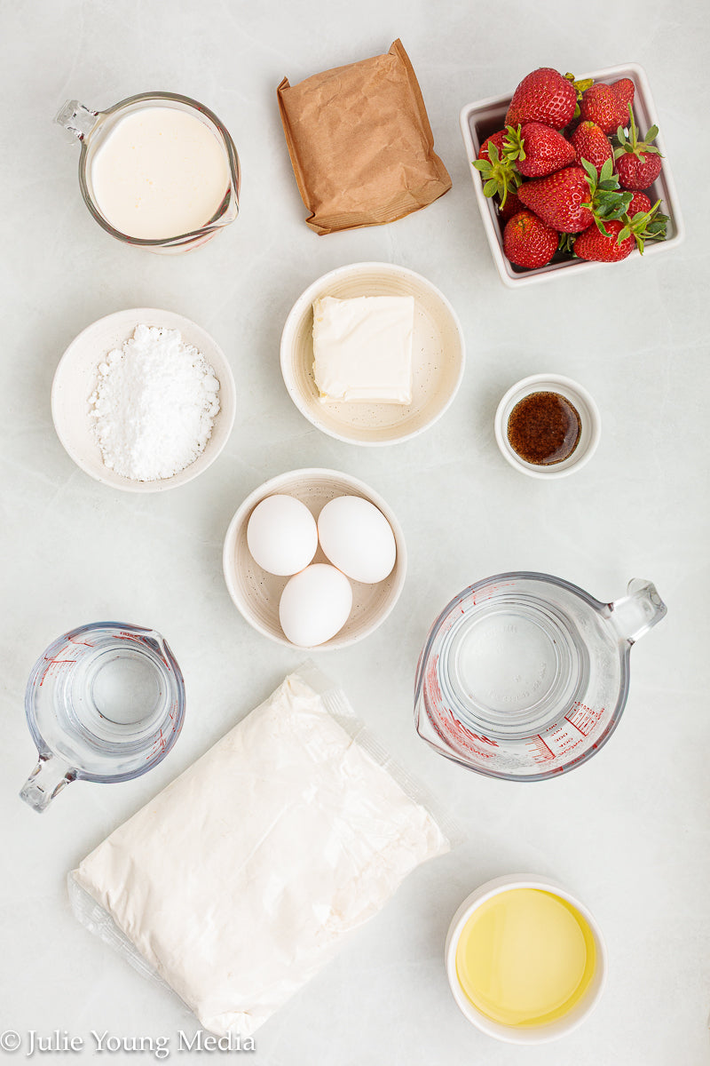 Strawberry Poke Cake with Whipped Vanilla Cream Cheese Frosting