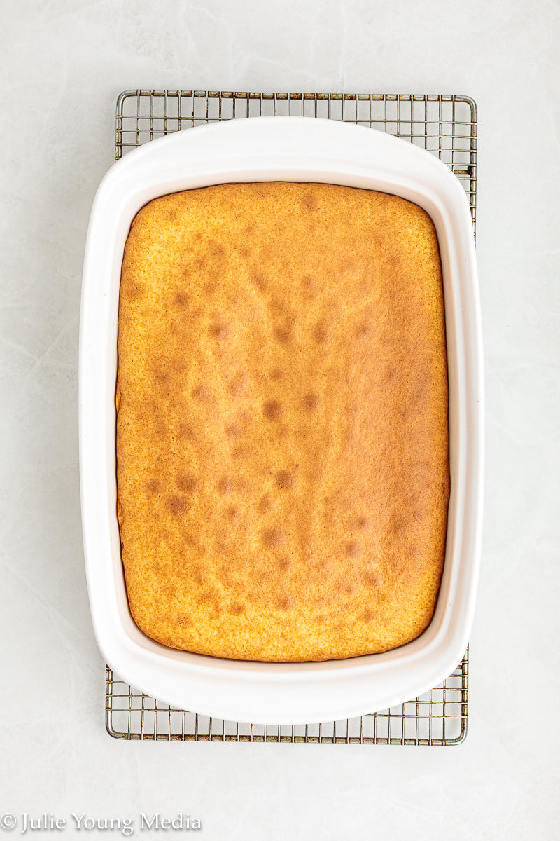 Strawberry Poke Cake with Whipped Vanilla Cream Cheese Frosting