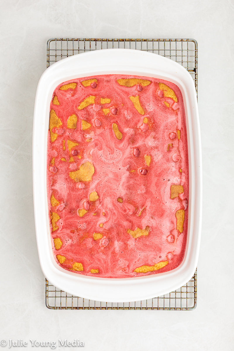 Strawberry Poke Cake with Whipped Vanilla Cream Cheese Frosting