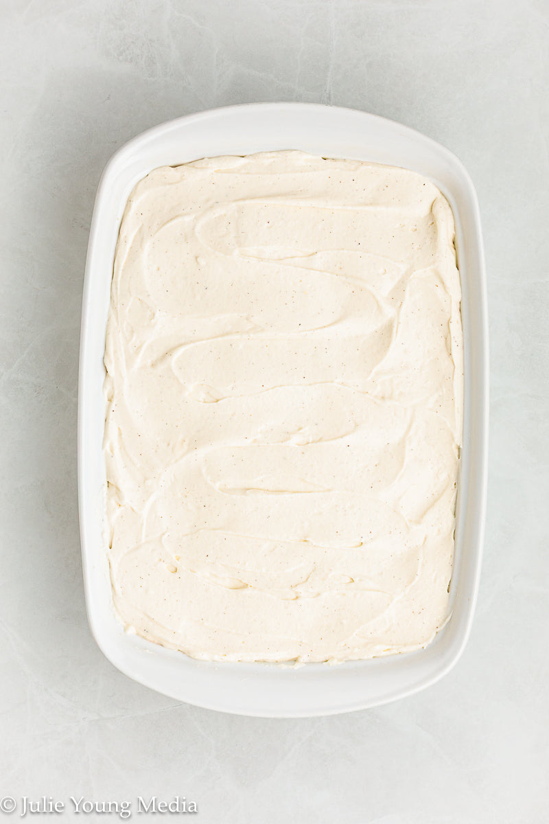 Strawberry Poke Cake with Whipped Vanilla Cream Cheese Frosting