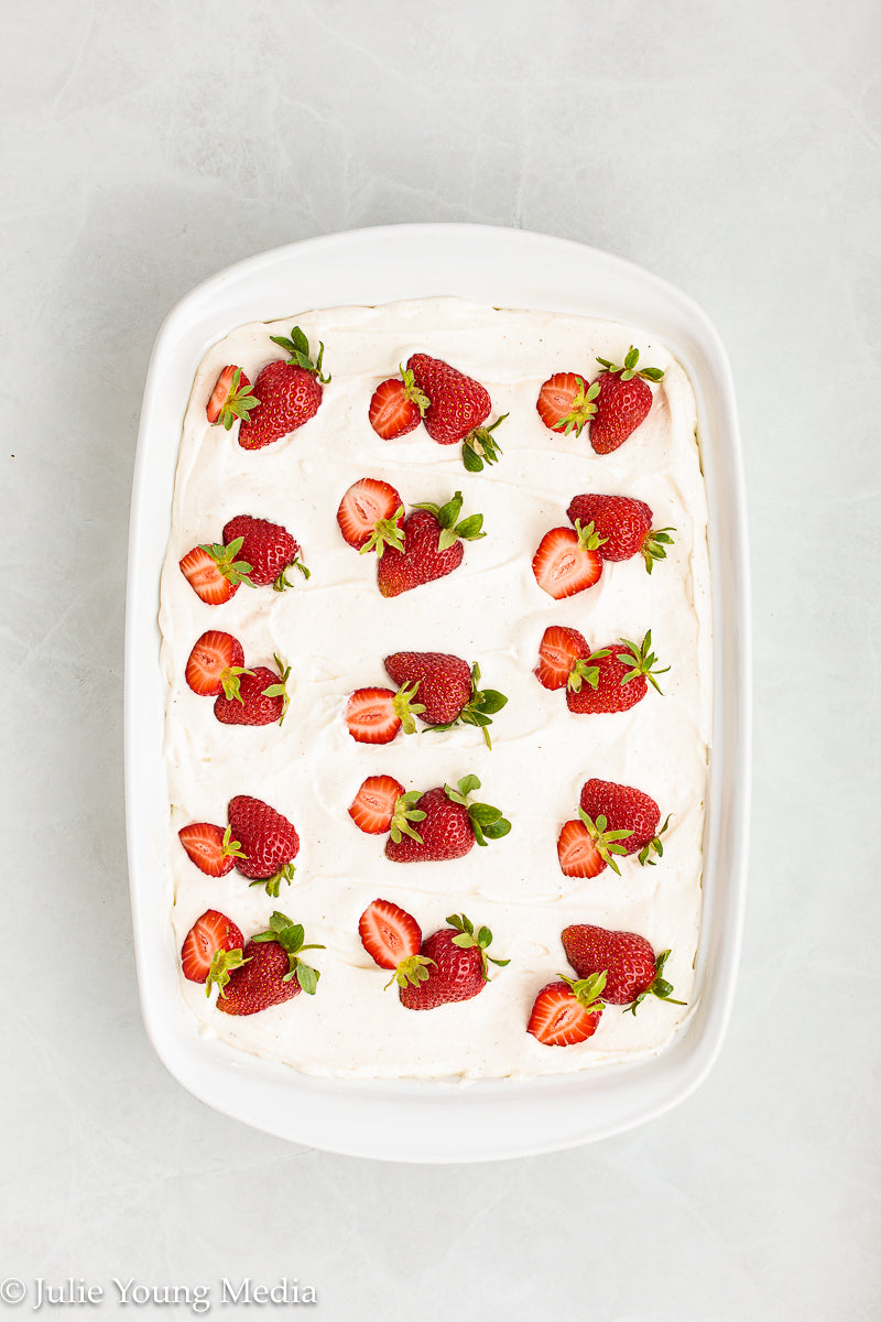 Strawberry Poke Cake with Whipped Vanilla Cream Cheese Frosting
