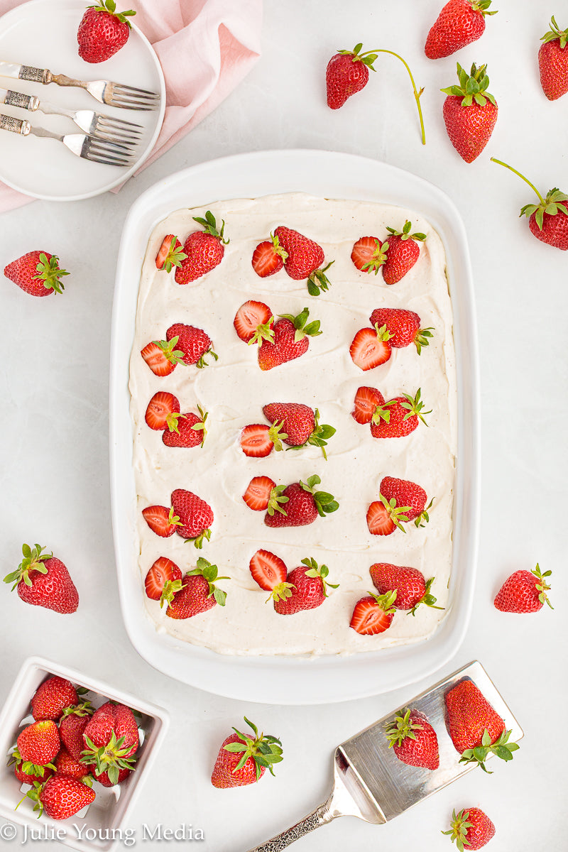 Strawberry Poke Cake with Whipped Vanilla Cream Cheese Frosting