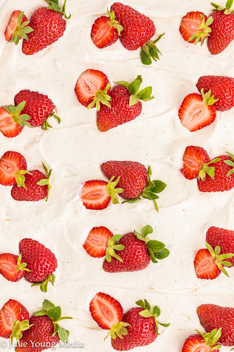 Strawberry Poke Cake with Whipped Vanilla Cream Cheese Frosting