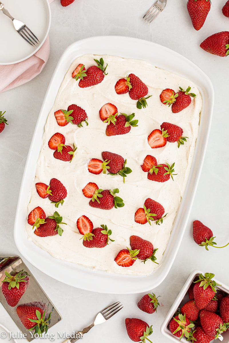 Strawberry Poke Cake with Whipped Vanilla Cream Cheese Frosting