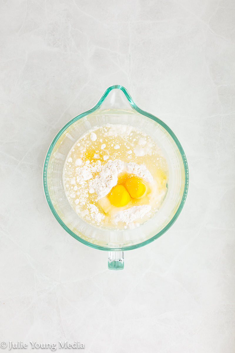Strawberry Poke Cake with Whipped Vanilla Cream Cheese Frosting
