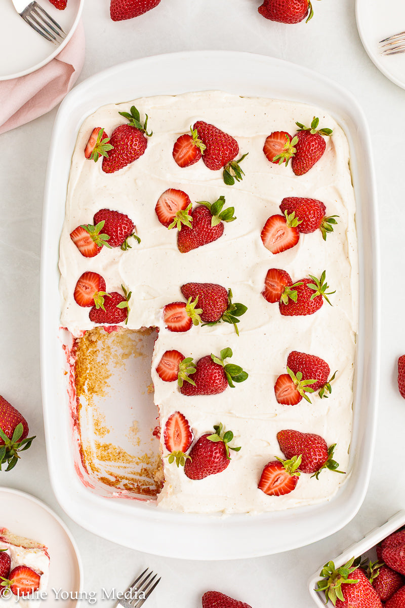 Strawberry Poke Cake with Whipped Vanilla Cream Cheese Frosting