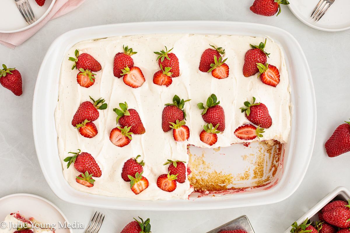 Strawberry Poke Cake with Whipped Vanilla Cream Cheese Frosting
