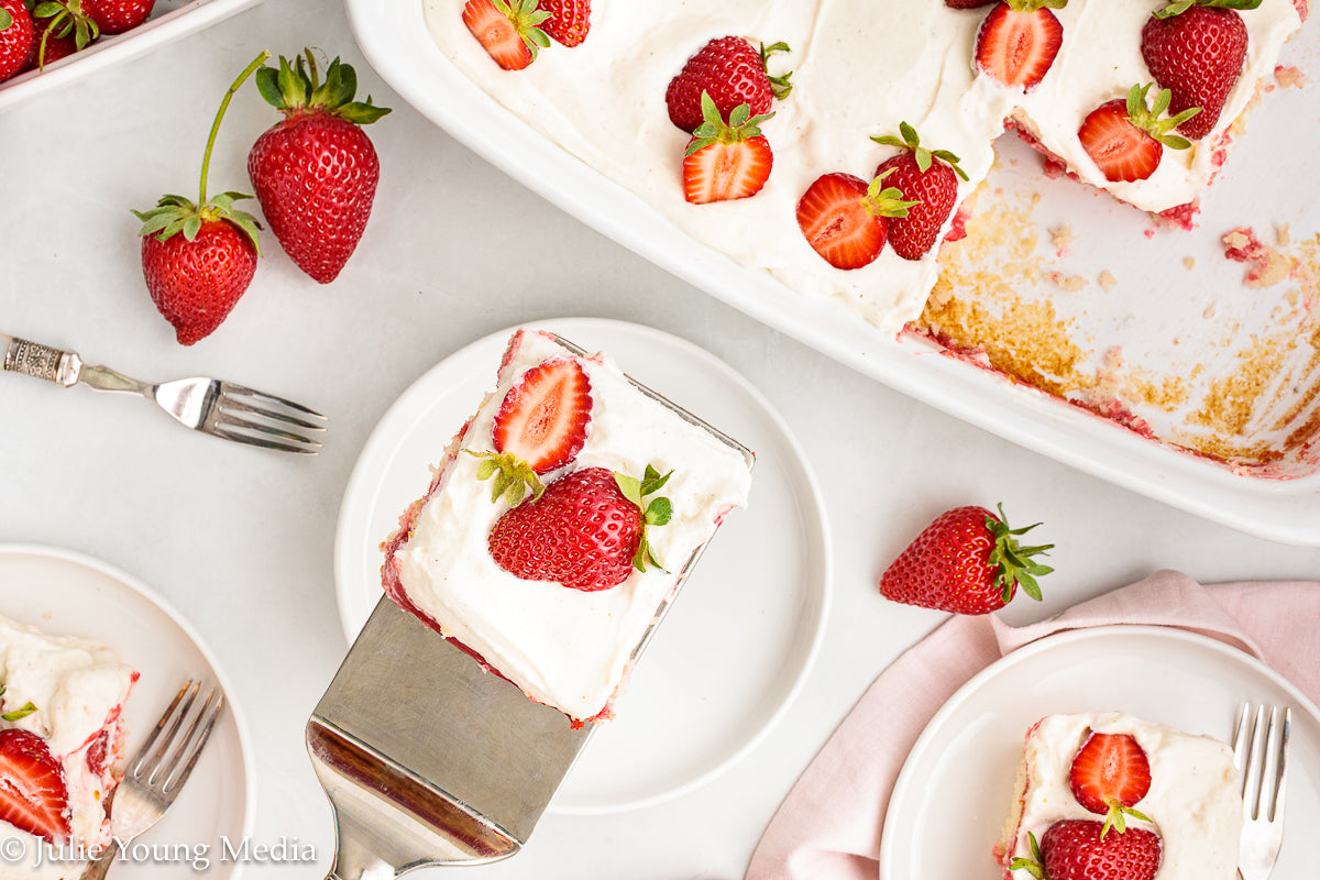Strawberry Poke Cake with Whipped Vanilla Cream Cheese Frosting
