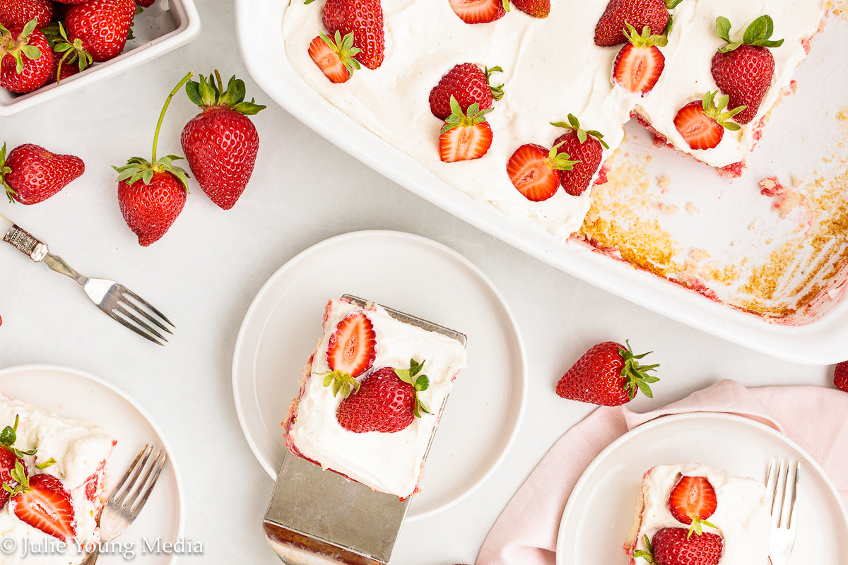 Strawberry Poke Cake with Whipped Vanilla Cream Cheese Frosting
