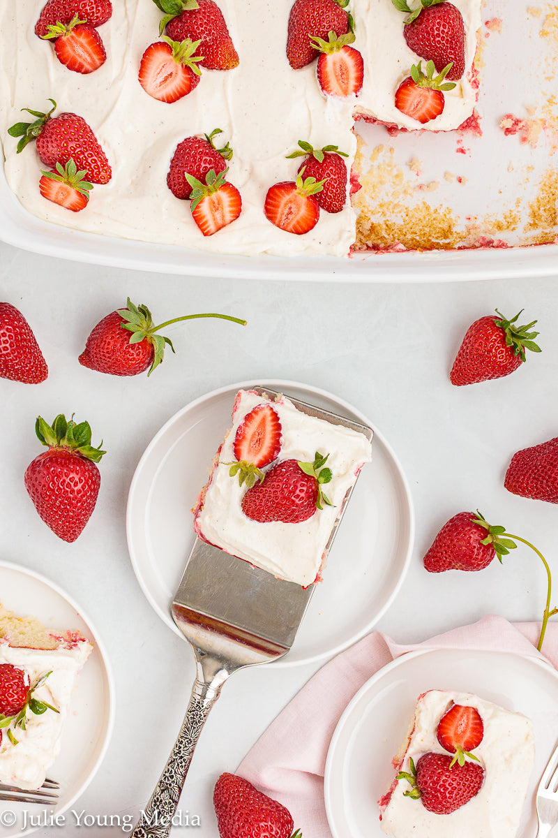 Strawberry Poke Cake with Whipped Vanilla Cream Cheese Frosting