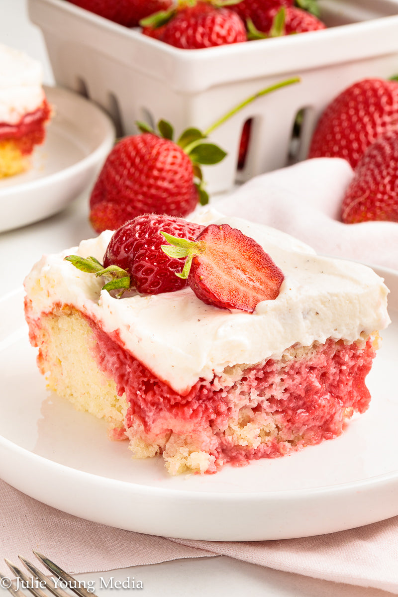 Strawberry Poke Cake with Whipped Vanilla Cream Cheese Frosting