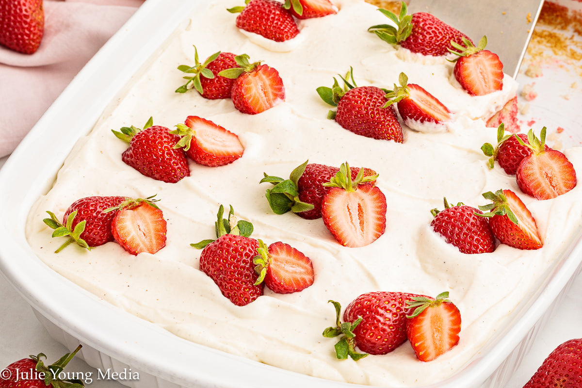 Strawberry Poke Cake with Whipped Vanilla Cream Cheese Frosting