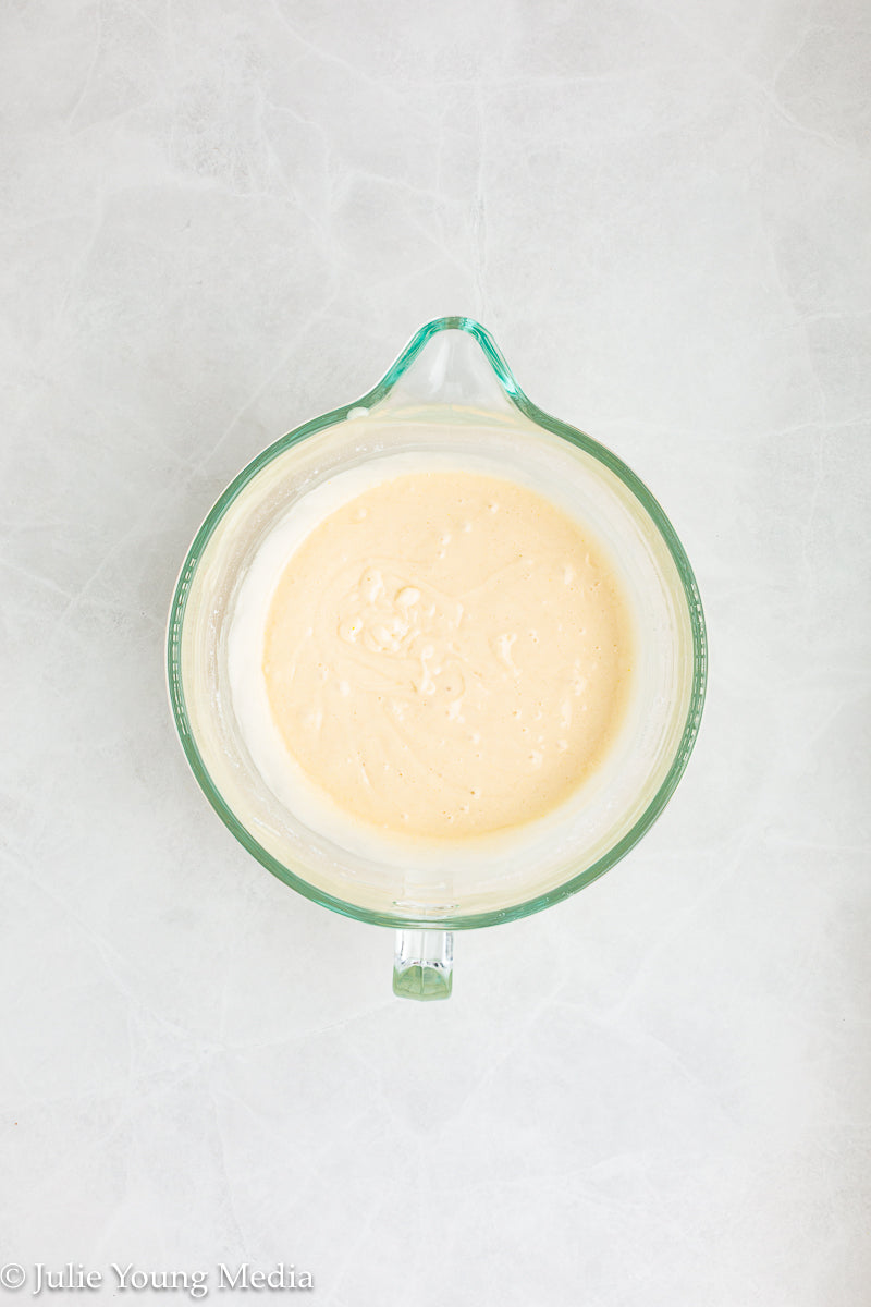 Strawberry Poke Cake with Whipped Vanilla Cream Cheese Frosting