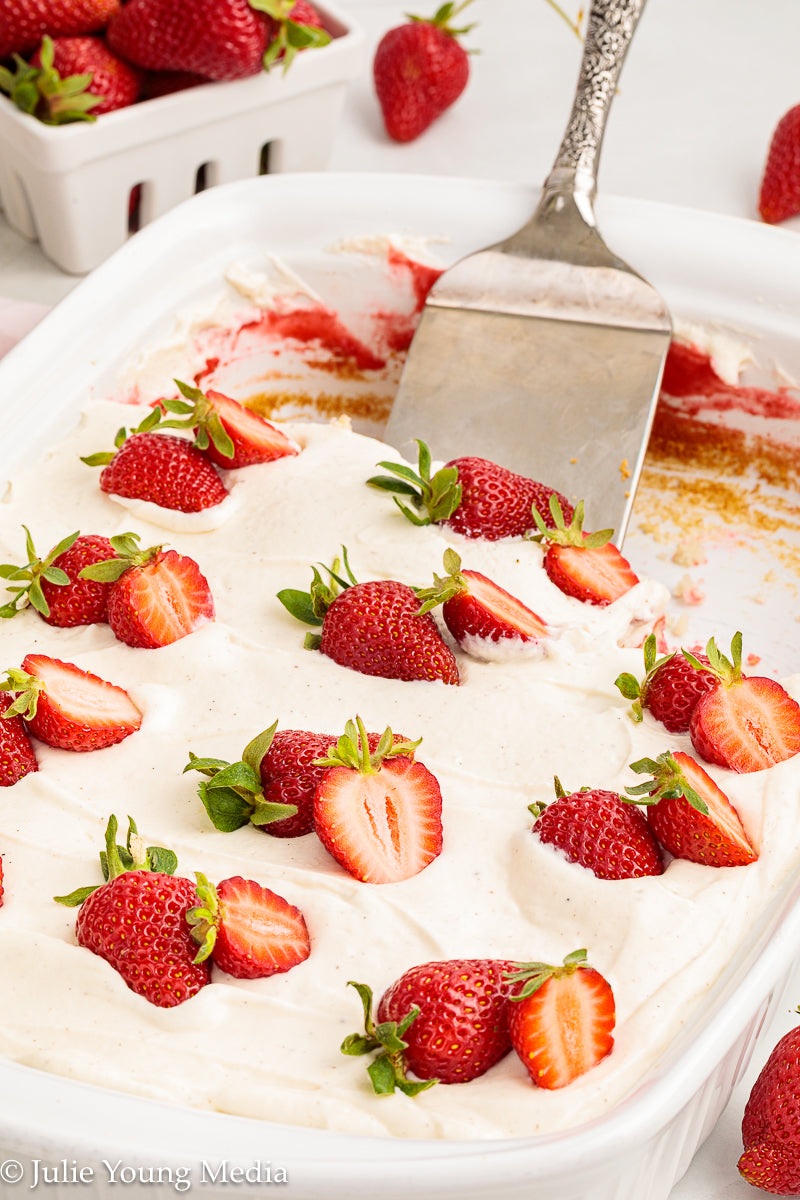 Strawberry Poke Cake with Whipped Vanilla Cream Cheese Frosting