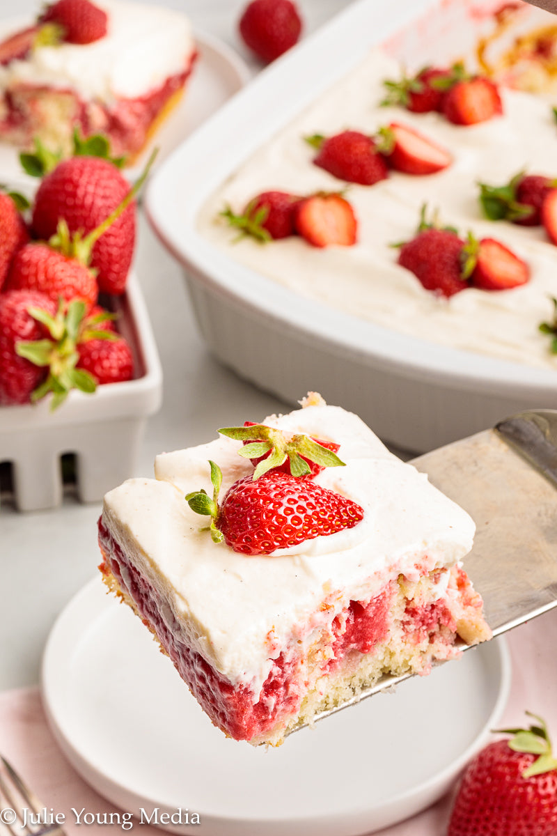 Strawberry Poke Cake with Whipped Vanilla Cream Cheese Frosting