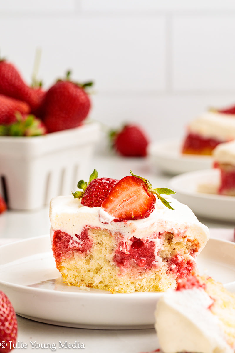 Strawberry Poke Cake with Whipped Vanilla Cream Cheese Frosting