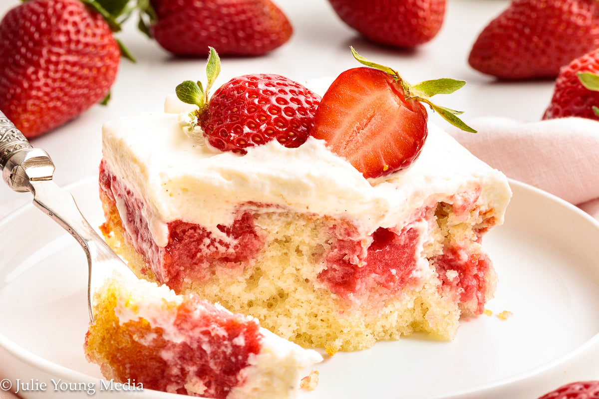 Strawberry Poke Cake with Whipped Vanilla Cream Cheese Frosting