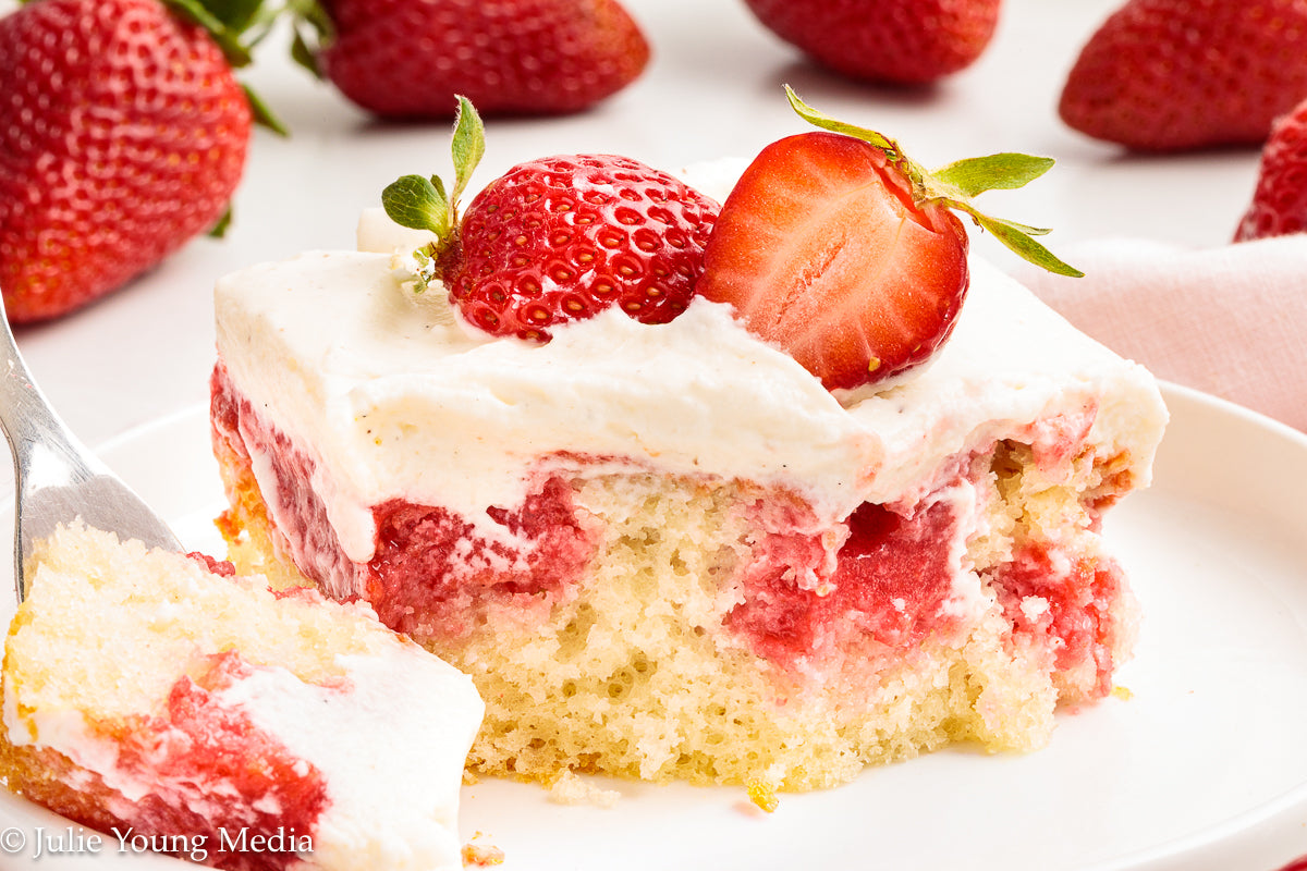 Strawberry Poke Cake with Whipped Vanilla Cream Cheese Frosting