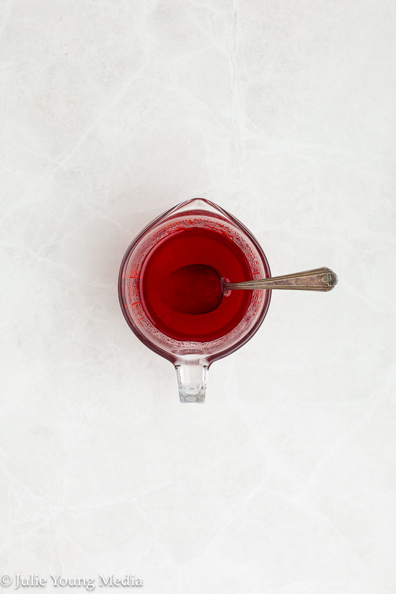 Strawberry Poke Cake with Whipped Vanilla Cream Cheese Frosting