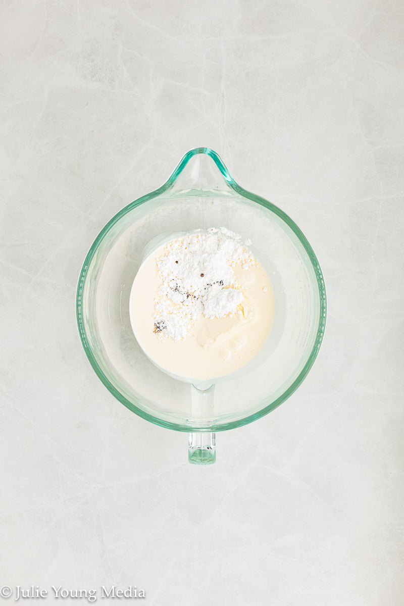 Strawberry Poke Cake with Whipped Vanilla Cream Cheese Frosting