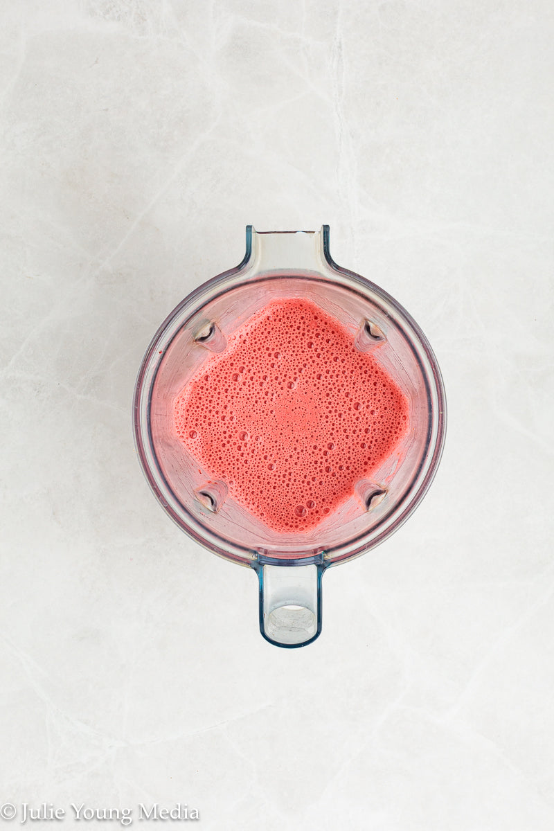 Strawberry Poke Cake with Whipped Vanilla Cream Cheese Frosting